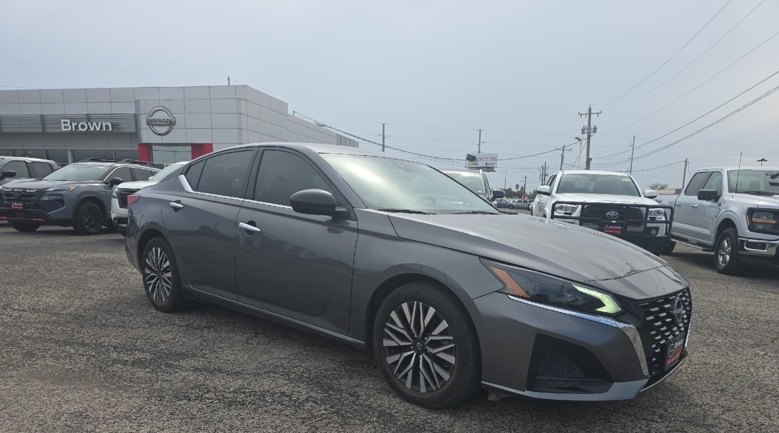 2024 Nissan Altima 2.5 SV in Gun Metallic — front three-quarter view