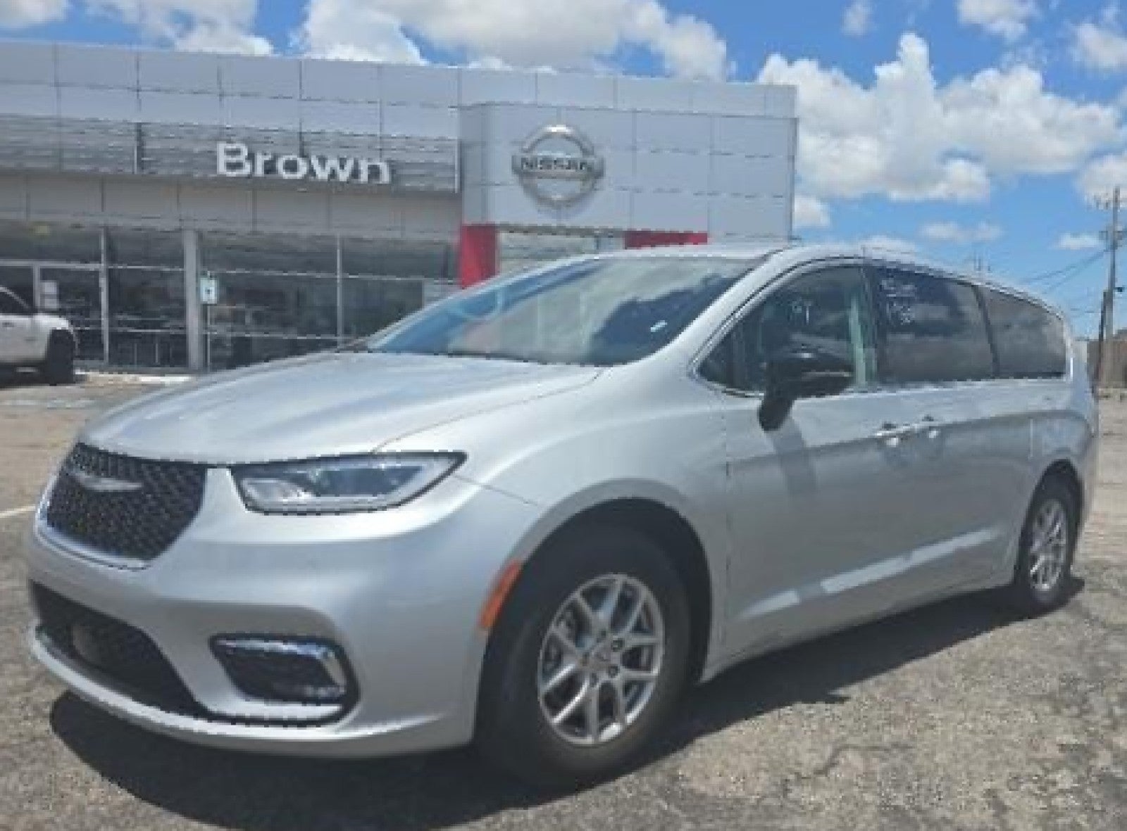 2024 Chrysler Pacifica Touring L in Silver Mist Clearcoat — front three-quarter view